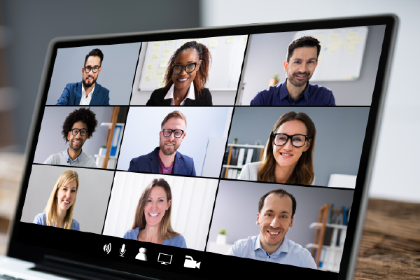 an image of a video conference call featuring 9 people displayed on a laptop screen