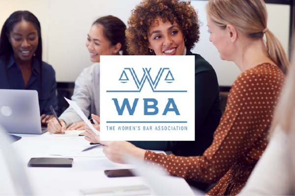 an image of women at a table talking with the logo of the Women's Bar Association layered in the center