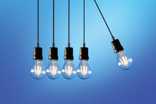 an image of lightbulbs arranged in a newton's cradle